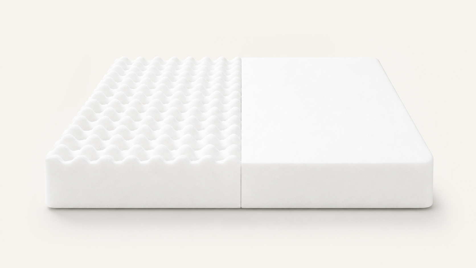 Hai nửa nệm foam màu trắng: mặt massage gợn sóng và mặt Balance Foam phẳng